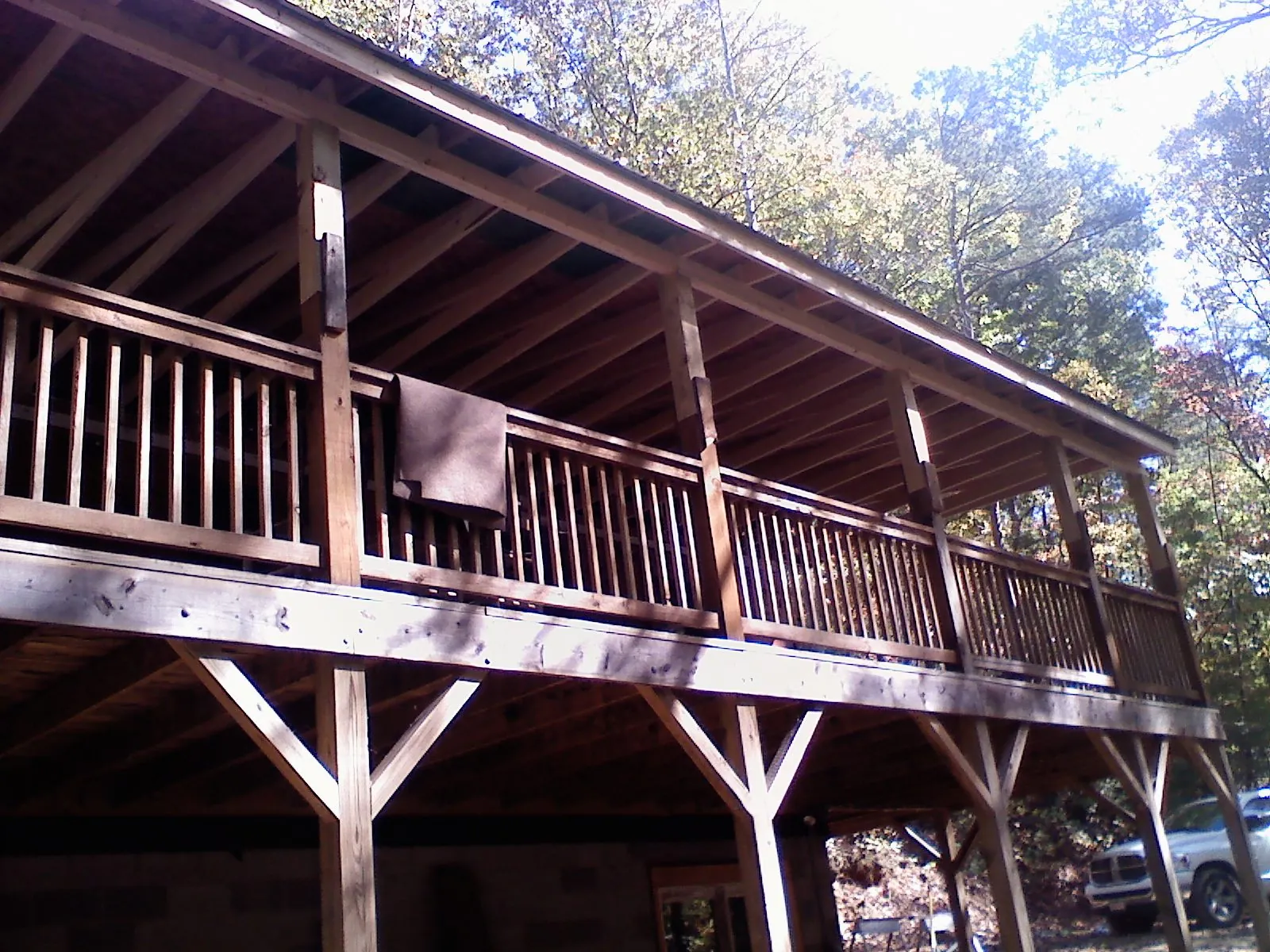 Timber framing under a new elevated porch and deck — Roof Leak Repair in Mc Grady by Roofing Brothers